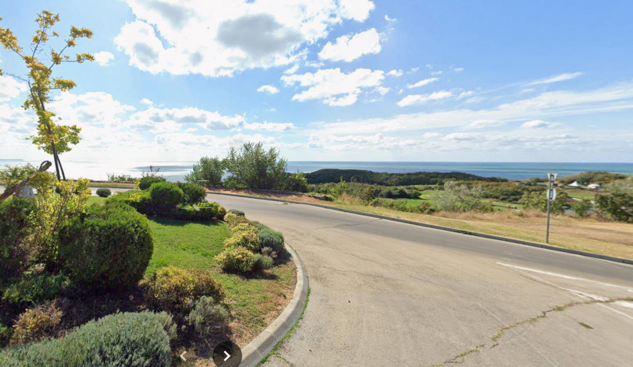 asphalt road thracian cliffs golf resort